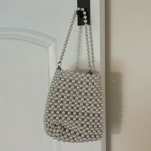 Pearl beaded bucket bag with 2 strap options.